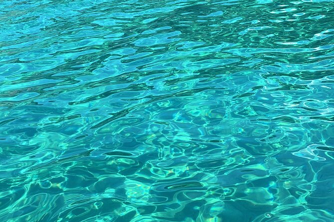 Blue Lagoon cruise: giant slide, music & Paphos hotel transfers - Blue Lagoon: snorkeling, borrowed masks, and the hour that counts