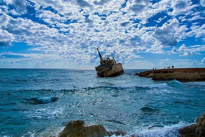 Blue Lagoon Latchi Pafos, boat trip with water slide F/D - Edro III Shipwreck and Sea Caves: Quick Photos With Real Coastline Drama