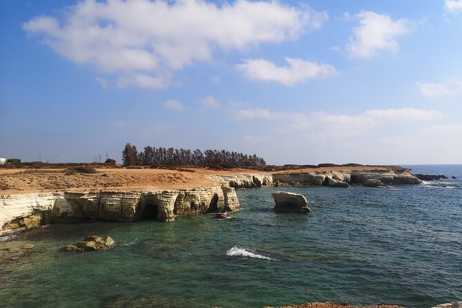 Blue Lagoon Latchi Pafos, boat trip with water slide F/D - Polis Bay Stop and Aphrodite’s Bath Restaurant Time