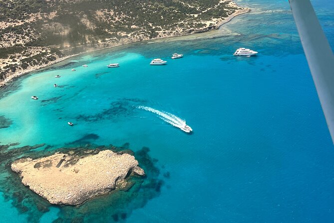 Blue Lagoon Latchi Pafos, boat trip with water slide F/D - Pickup From Paphos and the 8-Hour Reality Check