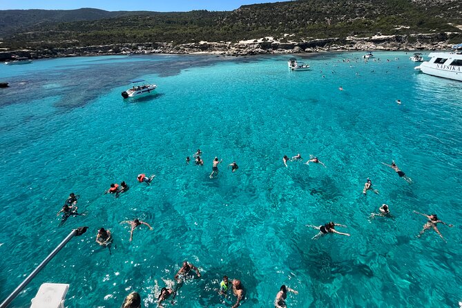 Blue Lagoon trip with slide & music departing from Latchi harbour - Weather reality check: choppy water can change the experience