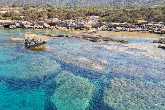 Demetris Chara Boat/Blue Lagoon boat trips with BBQ and SLIDE - From Paphos area to Latchi Harbour, pickup and where you meet