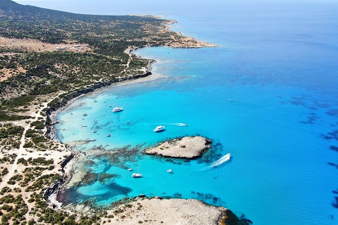 From Paphos: Blue Lagoon Cruise With Water Slide - The route highlights: Aphrodite’s Baths, Saint George’s Island, and sea caves