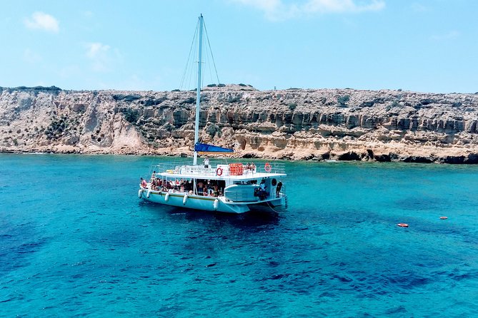Full-Day Family Catamaran Cruise from Limassol with Lunch - Cape Gata swim stop: snorkeling and swimming with instruction, not pressure