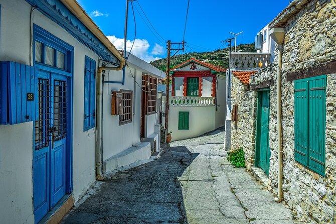 Full Day Tour in Troodos Mountains: Villages & Waterfalls - Omodos: Zivania, arkatena bread, and narrow-knit lacing