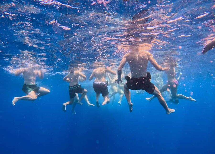 Larnaca: Glass-Bottom Boat Cruise with Fishing and BBQ Lunch - Swimming and snorkel stop after the wreck, then lunch starts to smell better