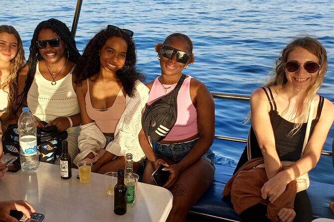 Larnaca Sunset Cruise with Unlimited Beers & Wine - Mackenzie beach: swim, snorkel, and aircraft-spotting payoff