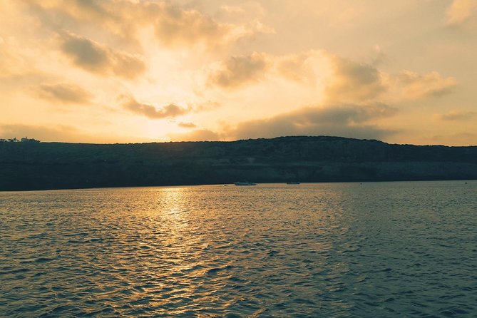 San Antonio Ruby Sunset Cruise from Protaras - Green Bay Beach Stop: Easy Time on Shore and Seaside Varosha Views